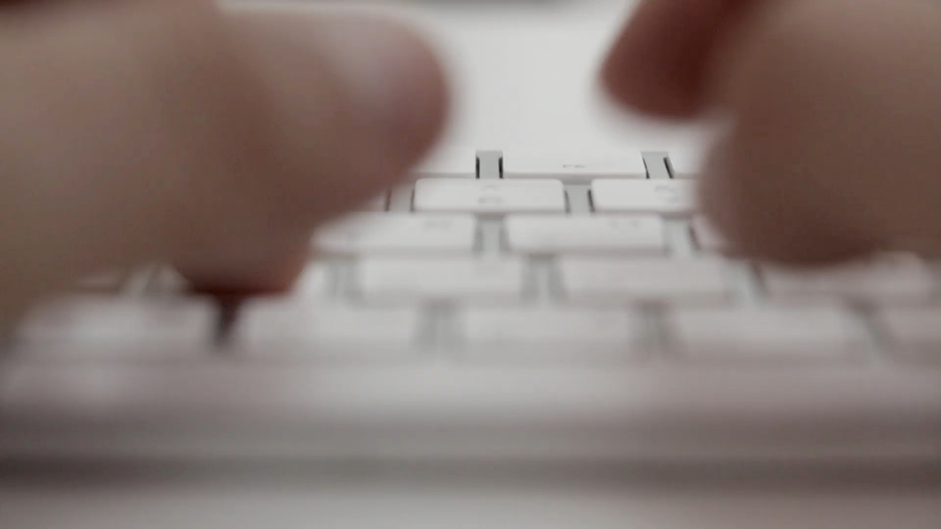 keyboard with hands typing